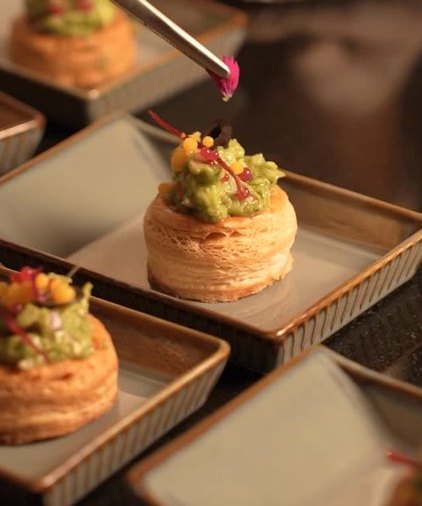 Vol-au-vents being garnished